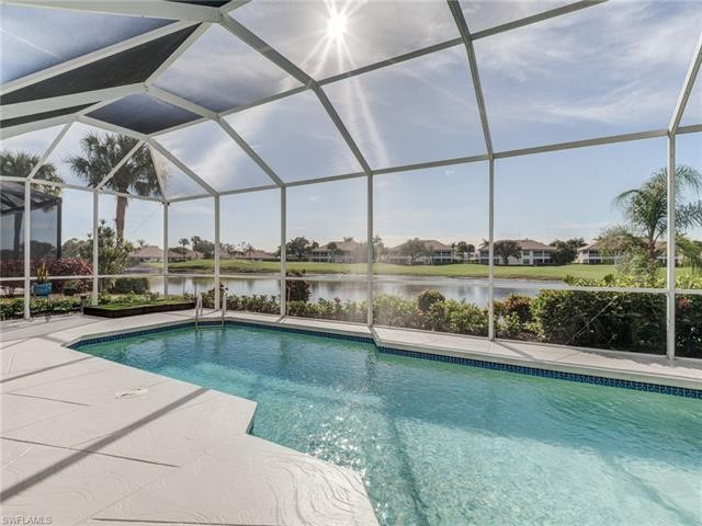 WATER & GOLF COURSE views come with this beautifully UPDATED - Beach Home for sale in Estero, Florida on Beachhouse.com