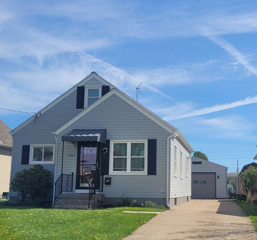 Beautifully Kept Millcreek Cape! Step into this charming home - Beach Home for sale in Erie, Pennsylvania on Beachhouse.com