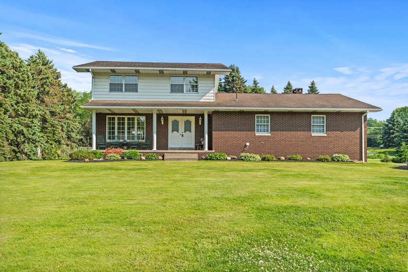 Welcome to this unique property nestled on a rare 5.44-acre - Beach Home for sale in Erie, Pennsylvania on Beachhouse.com