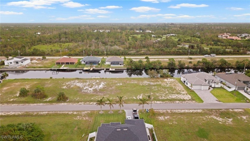 SAILBOAT ACCESS lot! Seawall and Concrete DOCK in place on 100 - Beach Lot for sale in Cape Coral, Florida on Beachhouse.com