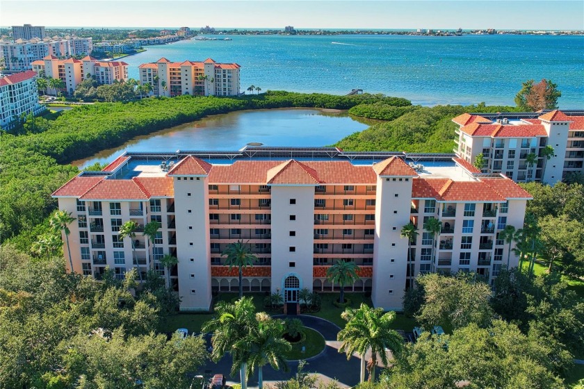 Experience waking up to breathtaking views of Boca Ciega Bay and - Beach Condo for sale in St. Petersburg, Florida on Beachhouse.com
