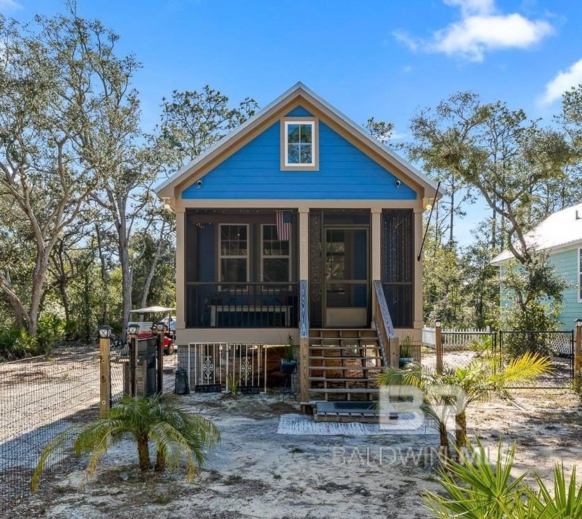 Coastal charm meets modern comfort in this furnished 2-bedroom - Beach Home for sale in Orange Beach, Alabama on Beachhouse.com