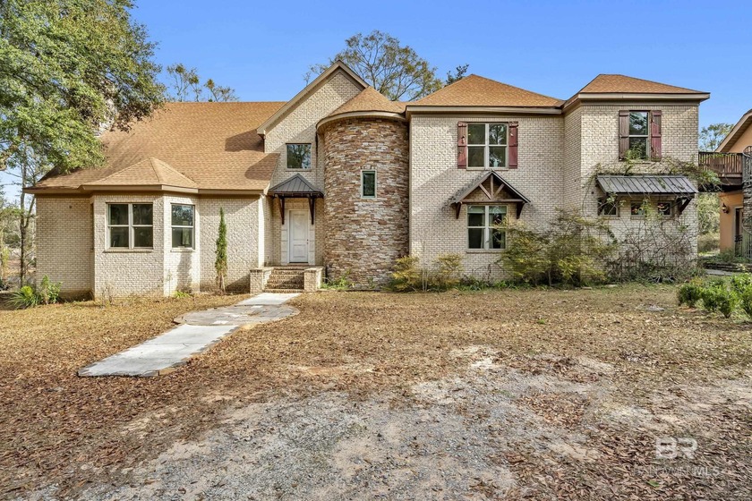 Tucked away on four private acres with views of a neighboring - Beach Home for sale in Daphne, Alabama on Beachhouse.com