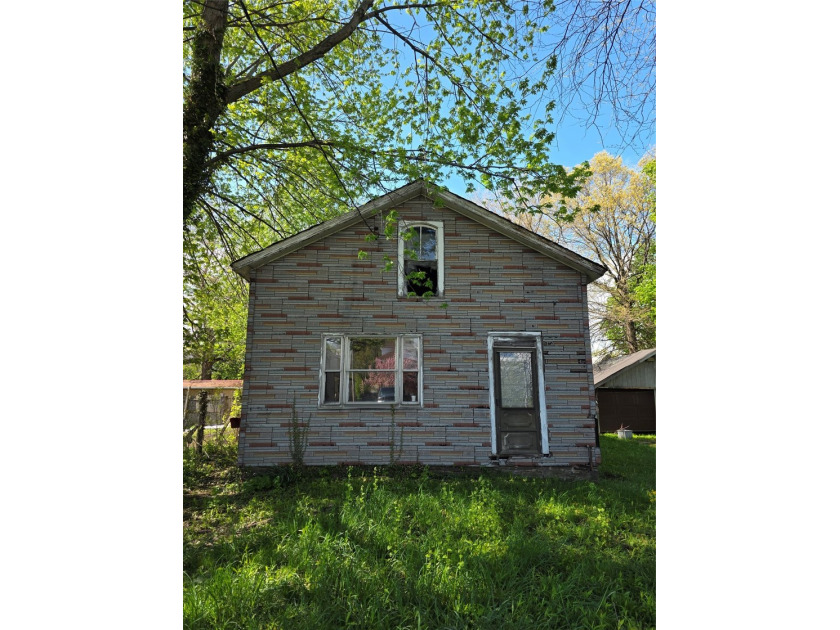 Investor special! A double lot offers a lot of potential as home - Beach Home for sale in Erie, Pennsylvania on Beachhouse.com