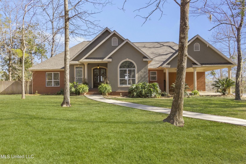 Welcome to 1400 Magnolia Bluff Blvd! This 3-bedroom, 2.5-bath - Beach Home for sale in Gautier, Mississippi on Beachhouse.com