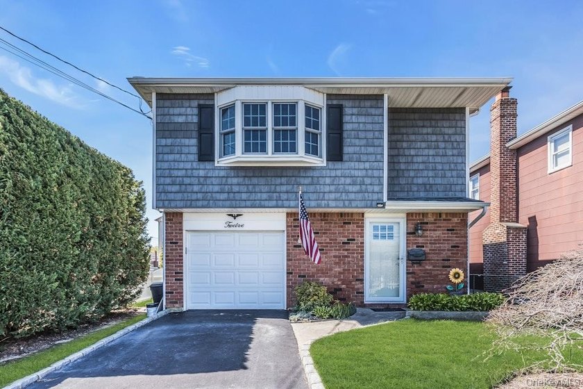 Unpack and enjoy your summer in this well-maintained In-line - Beach Home for sale in Lindenhurst, New York on Beachhouse.com
