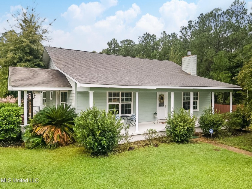 What a charming and practical home on a corner lot near the - Beach Home for sale in Pass Christian, Mississippi on Beachhouse.com