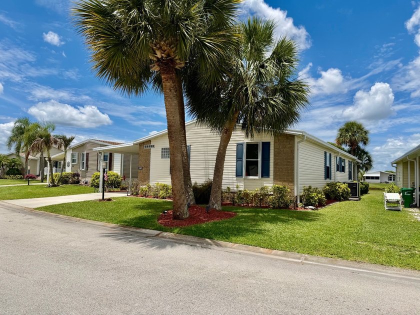 LAKEFRONT LIVING WITH PANORAMIC WATER VIEWS!  OVERVIEW - Beach Home for sale in Melbourne, Florida on Beachhouse.com