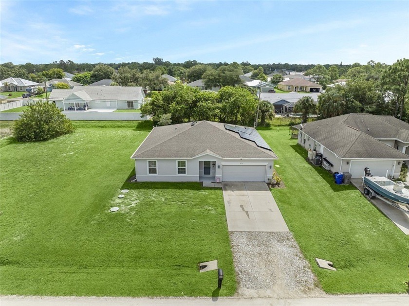 Step into this inviting 4-bedroom, 2-bath home where comfort and - Beach Home for sale in Vero Beach, Florida on Beachhouse.com