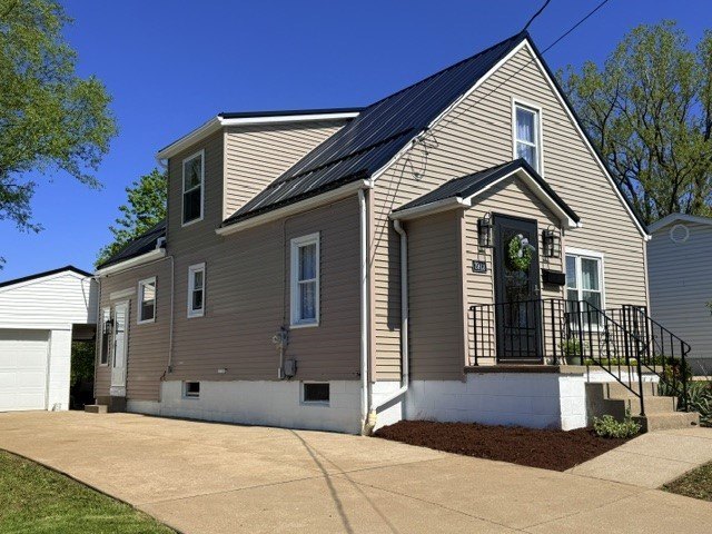 This beauty blends modern style with warm character & - Beach Home for sale in Erie, Pennsylvania on Beachhouse.com