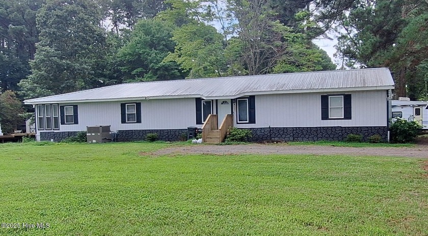 Waterfront Opportunity! 3 Bed, 3 Bath + Bonus Room | 2,100 Sq Ft - Beach Home for sale in Hertford, North Carolina on Beachhouse.com