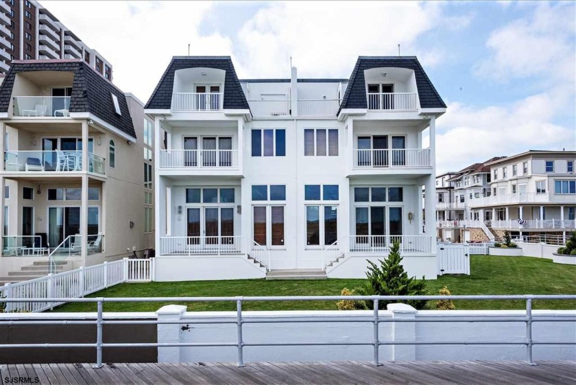 MAGNIFICENT OCEANFRONT TOWNHOME WITH ENDLESS OCEAN VIEWS! This - Beach Condo for sale in Atlantic City, New Jersey on Beachhouse.com