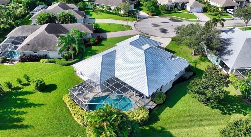 This sensational 4-bedroom 3-bath pool home is located on a - Beach Home for sale in Vero Beach, Florida on Beachhouse.com