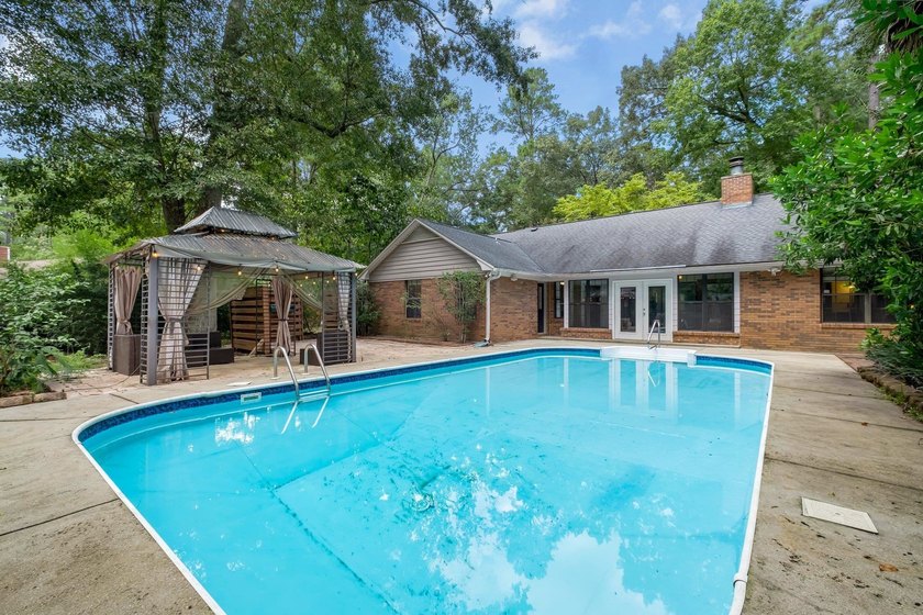 Tucked away in the coveted Killearn Lakes community, this - Beach Home for sale in Tallahassee, Florida on Beachhouse.com