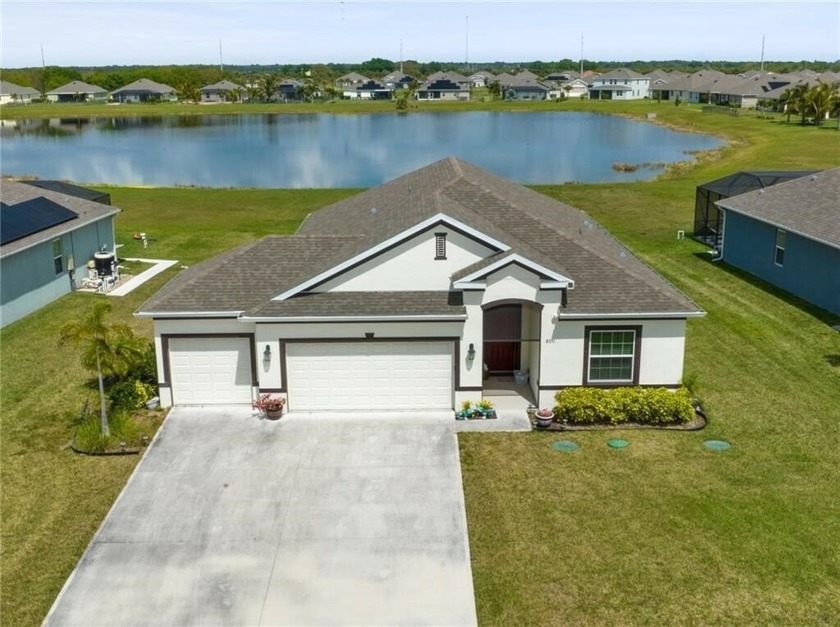 Lakefront home w/ views from the private screened-in lanai - Beach Home for sale in Micco, Florida on Beachhouse.com