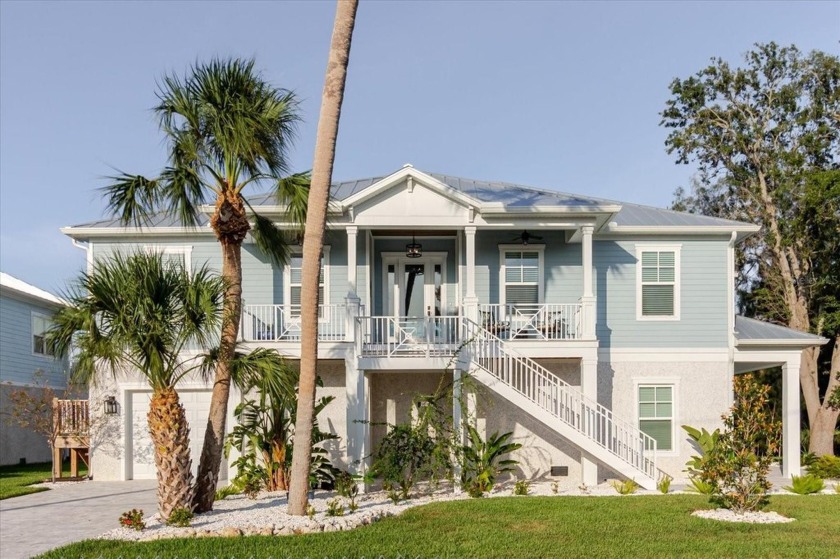 Live the Florida lifestyle in this stunning elevated custom - Beach Home for sale in Tarpon Springs, Florida on Beachhouse.com