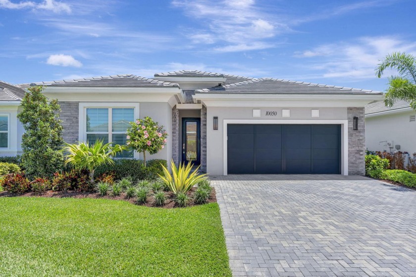 This McKenna is a beautiful home with a Contemporary elevation - Beach Home for sale in Palm Beach Gardens, Florida on Beachhouse.com