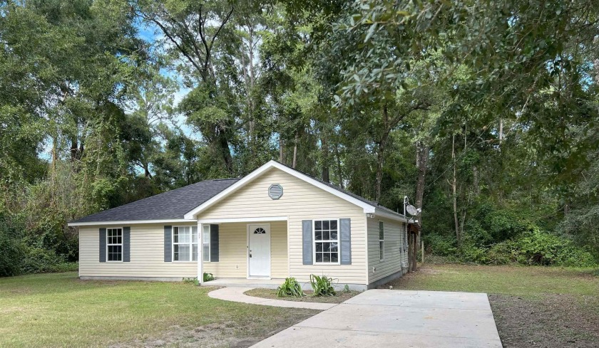 Super cute 3 bedroom, 2 bathroom home that backs up and is - Beach Home for sale in Crawfordville, Florida on Beachhouse.com