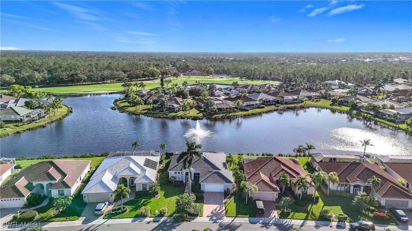 All day panoramic views of a lake and bubbling fountain come - Beach Home for sale in North Fort Myers, Florida on Beachhouse.com