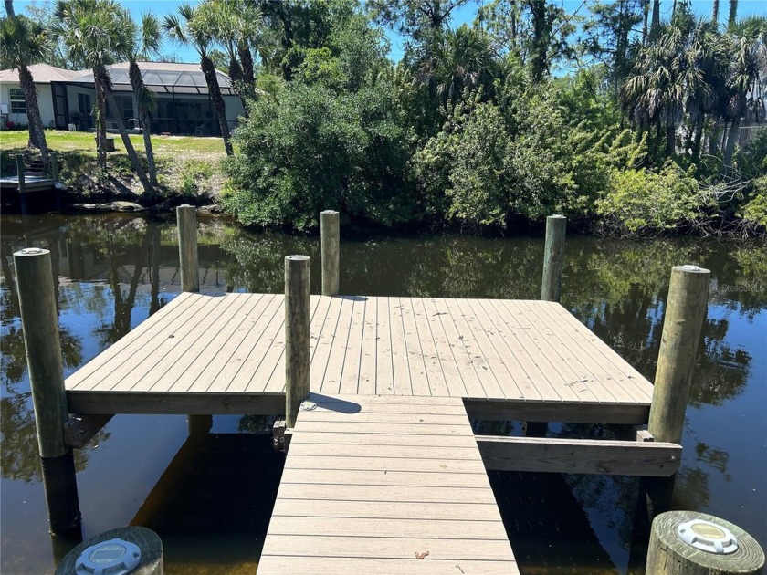 This partially cleared waterfront property boasts a brand-new - Beach Lot for sale in Port Charlotte, Florida on Beachhouse.com