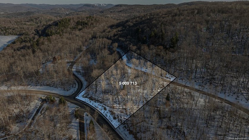 Magnificent 3,13-acre vacant lot nestled in the serene Lac - Beach Lot for sale in Mont-Tremblant, Quebec on Beachhouse.com
