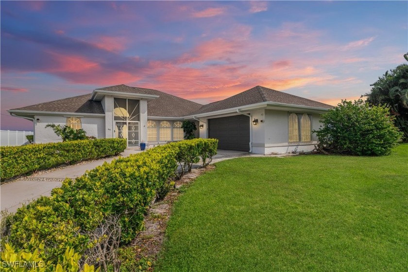 Lake front property with over 200 feat of seawall. On city water - Beach Home for sale in Cape Coral, Florida on Beachhouse.com