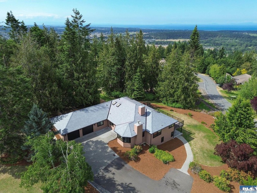 This one-of-a-kind Bell Hill residence is an entertainer's dream - Beach Home for sale in Sequim, Washington on Beachhouse.com