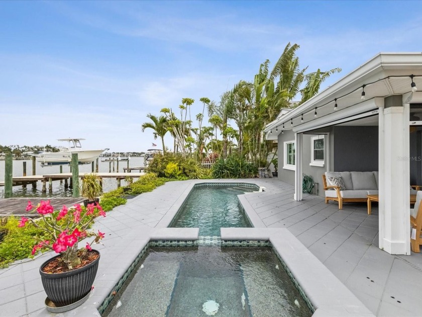 Welcome to your dream waterfront retreat, fully updated and - Beach Home for sale in Indian Rocks Beach, Florida on Beachhouse.com