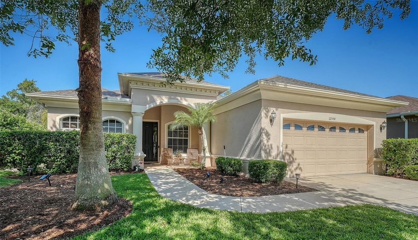 Under contract-accepting backup offers. Tucked behind a - Beach Home for sale in Bradenton, Florida on Beachhouse.com