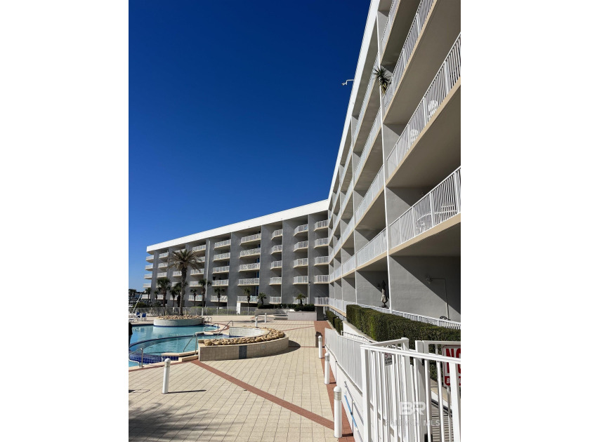 Bayfront living at its finest, this fifth-floor penthouse offers - Beach Home for sale in Orange Beach, Alabama on Beachhouse.com
