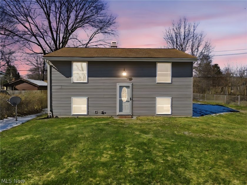 Beautifully updated 2-bedroom, 1-bath bi-level featuring a full - Beach Home for sale in Madison, Ohio on Beachhouse.com