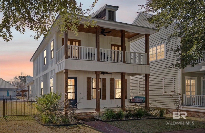 Tucked inside the canal-side community of The Retreat at Bon - Beach Home for sale in Gulf Shores, Alabama on Beachhouse.com