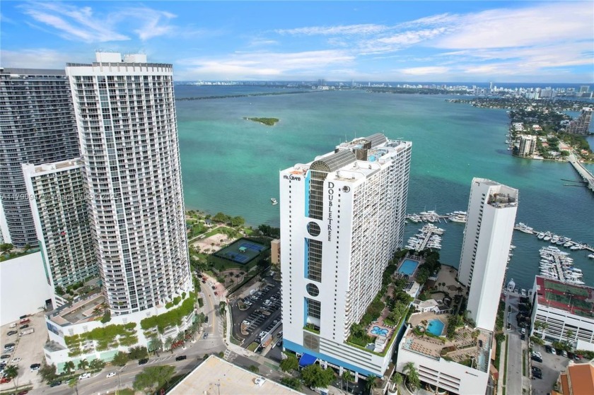 Enjoy panoramic bay and city views from this expansive 1-bedroom - Beach Condo for sale in Miami, Florida on Beachhouse.com