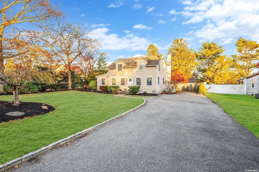 Welcome home to this beautiful center hall colonial on a - Beach Home for sale in Islip, New York on Beachhouse.com