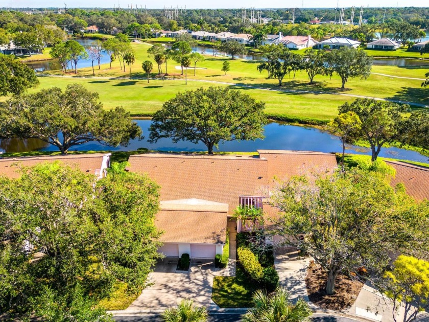 Spectacular pond framed by wide golf course views in The Meadows - Beach Home for sale in Sarasota, Florida on Beachhouse.com