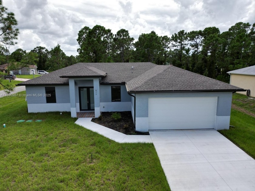 New Construction 3 bedrooms, 2 Bathrooms and 2 car garage corner - Beach Home for sale in Lehigh Acres, Florida on Beachhouse.com