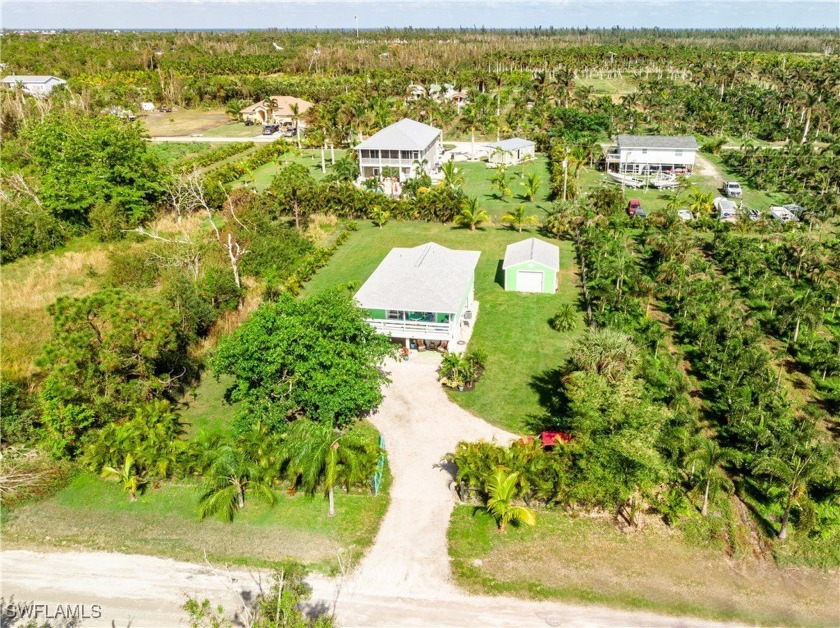 This remodeled two bedroom, one bath stilt home has a tropical - Beach Home for sale in Bokeelia, Florida on Beachhouse.com