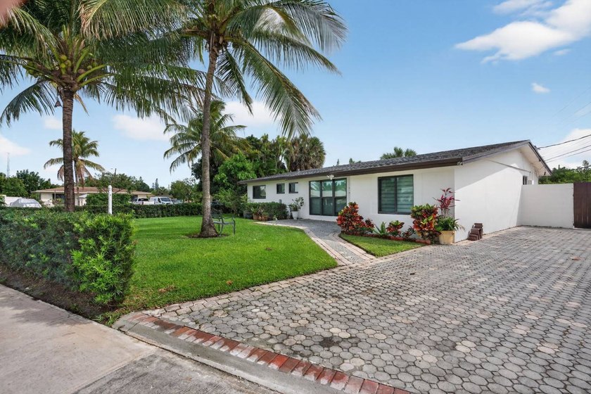 Discover this beautifully updated 3-bedroom, 2-bath home in the - Beach Home for sale in Deerfield Beach, Florida on Beachhouse.com