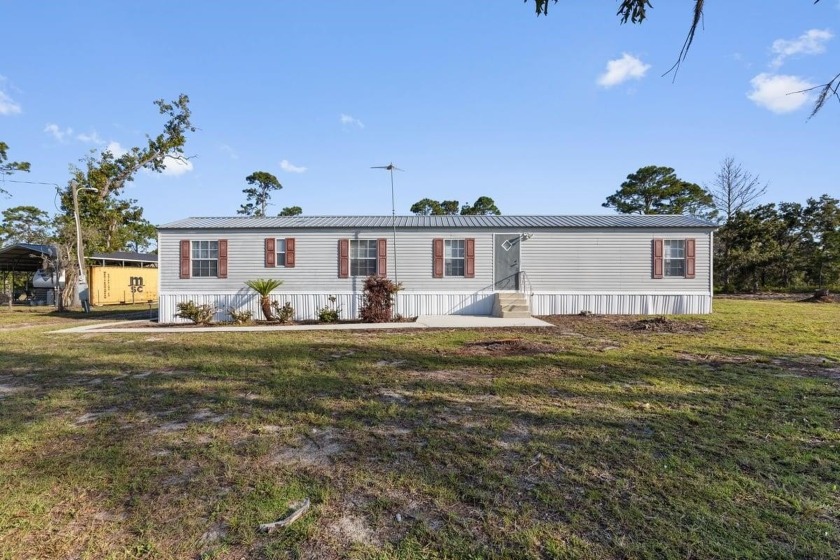 Nicely maintained single-wide mobile home situated on 1.7 acres - Beach Home for sale in Keaton Beach, Florida on Beachhouse.com
