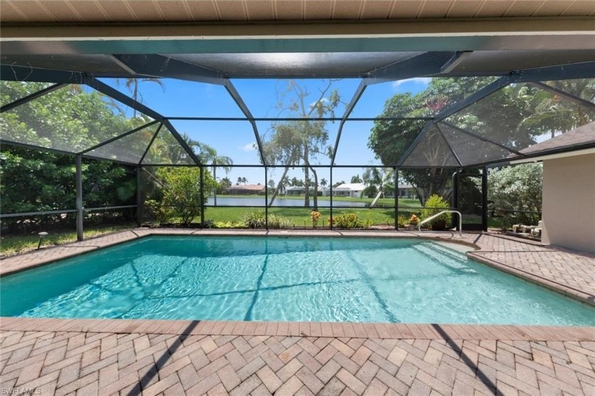 Huge Price Reduction! This stunning lake-view pool home is a - Beach Home for sale in Bonita Springs, Florida on Beachhouse.com