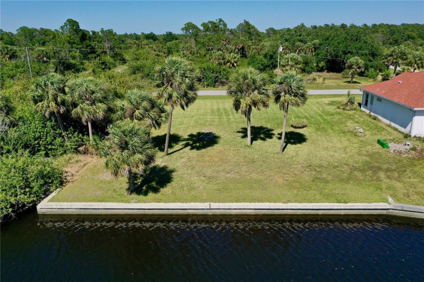 CLEARED, WATERFRONT LOT, RAISED AND HAS A FULL CONCRETE SEAWALL! - Beach Lot for sale in Port Charlotte, Florida on Beachhouse.com