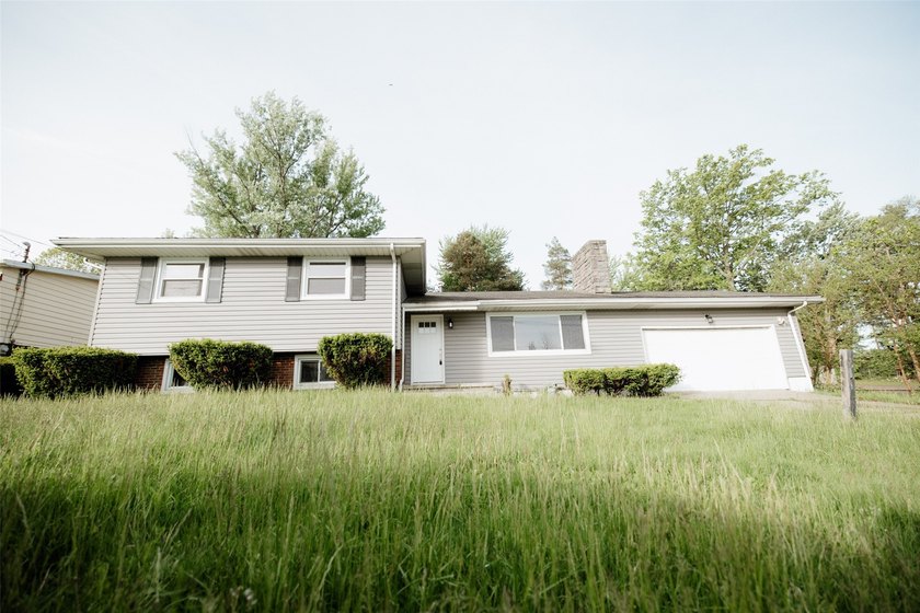 Welcome home to this beautifully renovated 4-bedroom, 2-bathroom - Beach Home for sale in Erie, Pennsylvania on Beachhouse.com