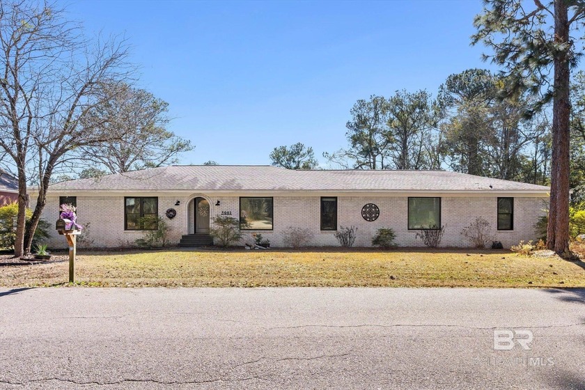 Welcome to waterfront living and pure serenity. This beautifully - Beach Home for sale in Mobile, Alabama on Beachhouse.com