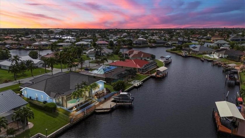 This Gulf-access custom built home is a true standout. A large - Beach Home for sale in Cape Coral, Florida on Beachhouse.com