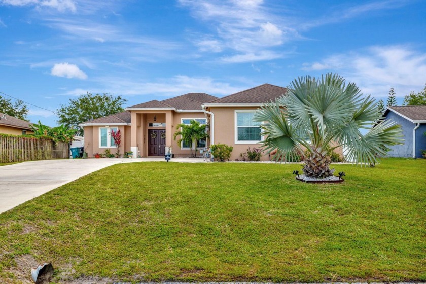 Welcome to modern Florida living in this custom-built gem - Beach Home for sale in Port Saint Lucie, Florida on Beachhouse.com