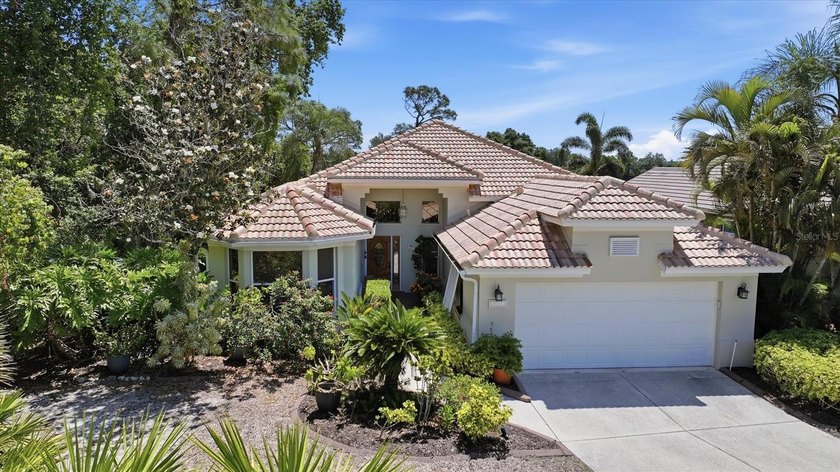 Tucked within the award-winning University Park Country Club - Beach Home for sale in University Park, Florida on Beachhouse.com
