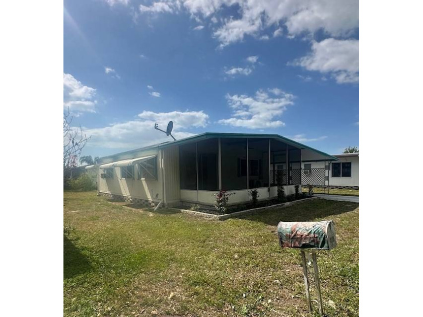 This move-in ready home offers comfort, convenience, and value - Beach Home for sale in New Port Richey, Florida on Beachhouse.com
