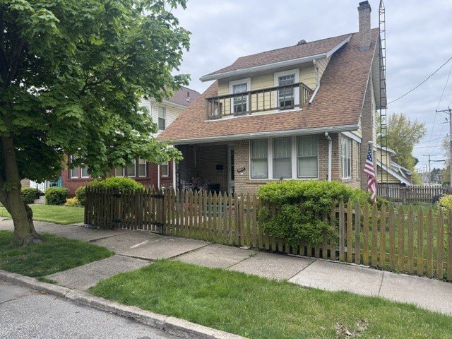 Brick two-story home on a corner lot with a detached 1-car - Beach Home for sale in Erie, Pennsylvania on Beachhouse.com