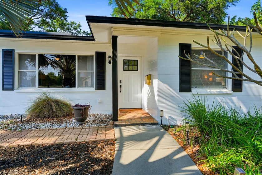 This beautifully updated single-story residence offers 4 - Beach Home for sale in St. Petersburg, Florida on Beachhouse.com