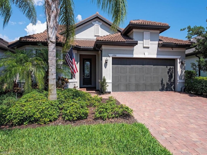 This elegant Fiddler's Creek two-story home has an expansive - Beach Home for sale in Naples, Florida on Beachhouse.com